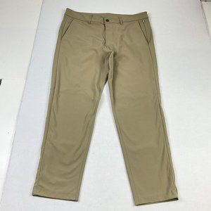Lululemon Mens Commission Slim Leg Chino Pants Beige Stretch Pockets Size 34